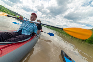 Kayak tourists on the Dniester River, Ivano-Frankivsk city, May 4, 2016