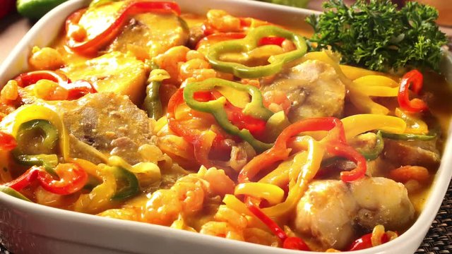 Slide shot typical Portuguese dish with codfish called Bacalhau do Porto in a original portuguese plate. 4K footage