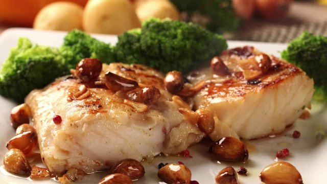 slide shot cod fish with smoke