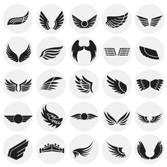 Wings icons set on circles background for graphic and web design. Simple vector sign. Internet concept symbol for website button or mobile app.