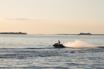 Naklejka premium fishing boat at sunset