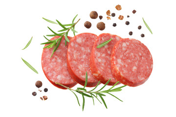 sliced sausage salami with rosemary and peppercorns isolated on white background. top view