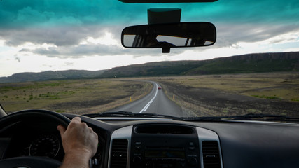 Driver on a dirty road in Iceland point of view