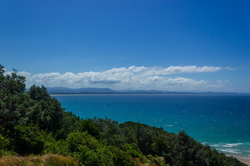Fototapeta na wymiar Clear water at the Pass on a sunny day in Byron Bay, Queensland, Australia
