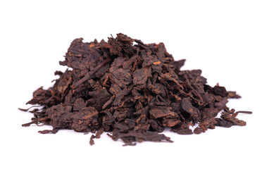 Chinese tea Shou Puer. Pressed fermented Pu-erh tea. Macro close up. Aromatic black puer tea....