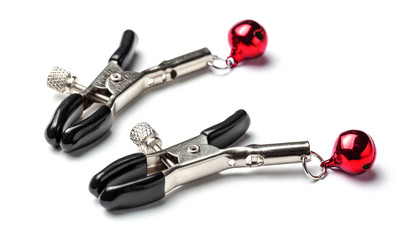 Nipple clamps made of metal with red bells. BDSM Sex games. Isolated on white background