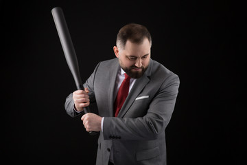 bearded Man in suit and red tie with baseball bat