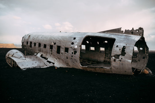 Damaged plane in desolated field