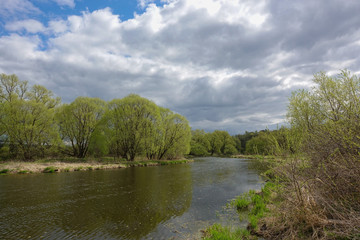 Landscape with the river on cloudy day