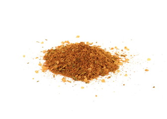 Grounded spice ingredient of dry mix vegetables isolated on white. Chicken spices. A pile of a yellow spice mix. Spices consist dried dehydrated vegetables carrot paprika onion garlic parsnip parsley 