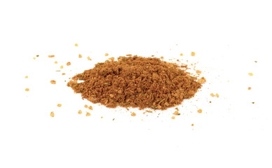 Grounded spice ingredient of dry mix vegetables isolated on white. Chicken spices. A pile of a yellow spice mix. Spices consist dried dehydrated vegetables carrot paprika onion garlic parsnip parsley 