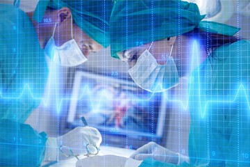 Group of doctors doing operation