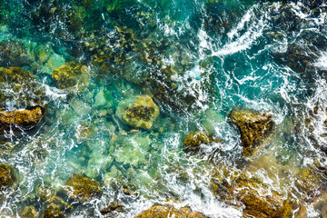Aerial view to ocean waves, water background.