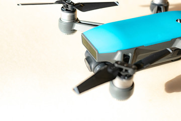 Blue drone on yellow background