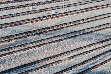 Top view of the rails, concrete sleepers and mound of crushed stone.