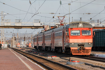 Fototapeta na wymiar Train stands on railroad tracks. Train for intercity passenger traffic.