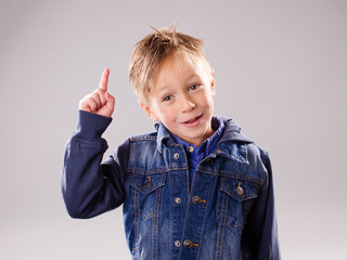 Little boy with raised finger