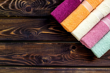 Obraz na płótnie Canvas Bath accessories made of cotton set with towels on wooden background top view mockup