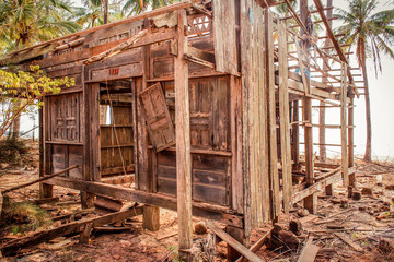 Fototapeta premium destroyed home , wooden hut ruin / destroyed house 