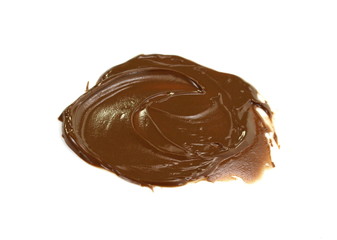 Melted hot chocolate. Drop isolated on white background. Hot melted chocolate pouring isolated on white background, with clipping path