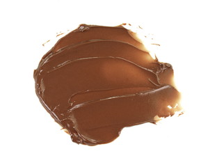 Melted hot chocolate. Drop isolated on white background. Hot melted chocolate pouring isolated on white background, with clipping path