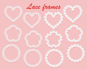 Set of white lace frames of various shapes. Ring, heart and flower. Openwork vintage elements isolated on a pink background