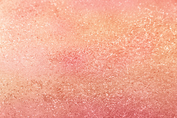 Classic living coral, peach, salmon glitter background with selective focus - abstract texture