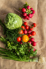 Healthy food background. Assortment of fresh vegetables on paper background