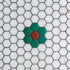 background texture-weathered hexagon red, green and white mosaic tile pattern