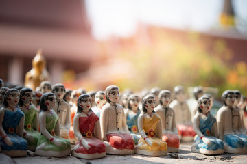 Doll for votive on the temple wall ,Superstition concept