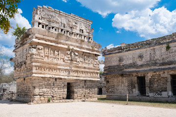Temple with elaborate carvings at the ancient mayan city of Chichen Itza in Mexico - 267003439