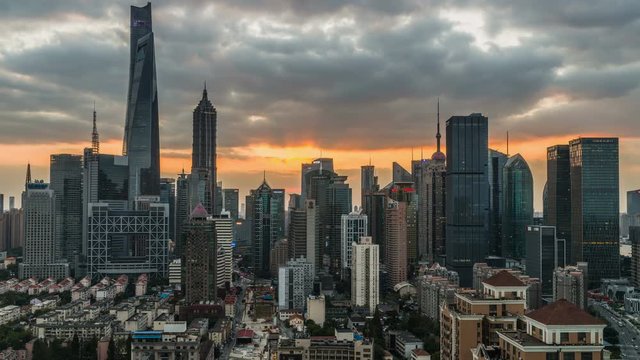 Sunset Lujiazui - A time-lapse of panoramic sunset view of Shanghai skyline, including its three tallest skyscrapers, Shanghai Tower, Shanghai World Financial Center and Jin Mao Tower, China.