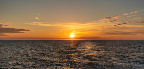 Sunset from the ferry over water