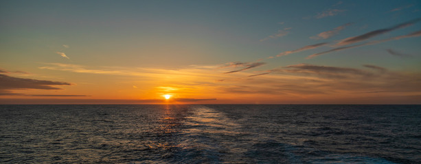 Sunset from the ferry over water