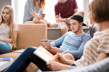 Students resting together in campus building