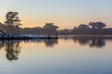 Early morning mist over Hopkins River pier in Victoria, Australia