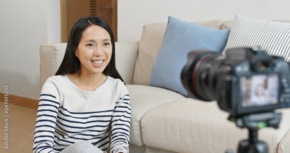 Sticker woman sit in front of camera and talk