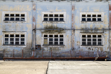 Abandoned warehouse windows seen from front