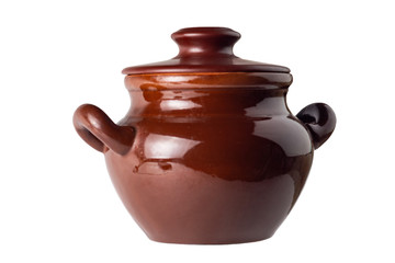 brown clay pot for stewing meat and vegetables on white
