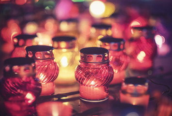 Laying candles in memory of those killed in disasters, war and global cataclysms