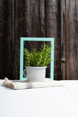 turquoise blue picture frame and lavender decoration at enamel mug