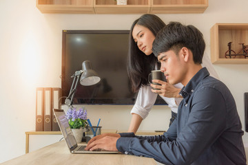 Manager and secretary working in the office