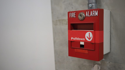 Emergency of Fire alarm or alert or bell warning equipment in red color. AT the building for safety.