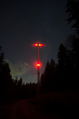 Wind turbine at night, exposure, forest