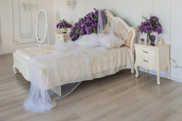 double bed in luxury interior decorated violet lilac composition