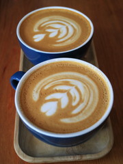 An image of a cup of cappuccino. Latte art.