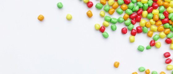 Close up of colorful candies isolate on white background               