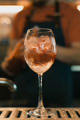 Barman making a cocktail at the bar