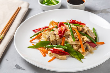 Chow Mein egg noodles with vegetables and mushrooms