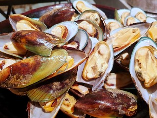 Top view of steamed mussels cooked steak as a background in restaurant, Ready to eat or cooking